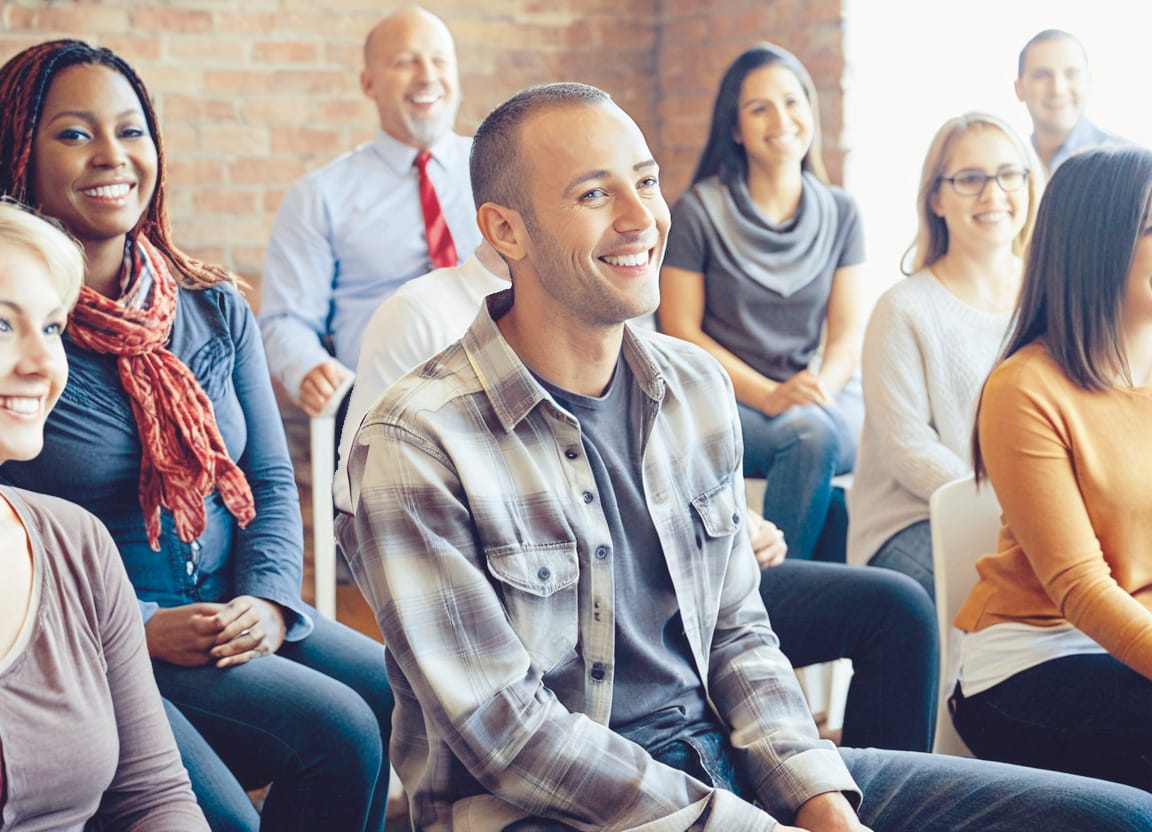 Workshop attendees smiling